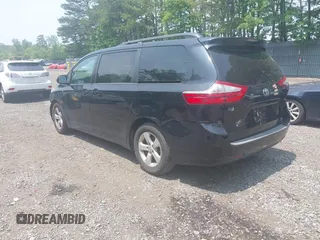 2015 Toyota Sienna LE AAS with VIN 5TDKK3DC8FS587644, listed as a IAAI auction lot 42332813 with 125,675 mi miles and . Bid and sale history available at DreamBid. Image 3.