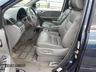 2010 Honda Odyssey EX-L z VIN 5FNRL3H76AB071109, wystawiony jako Copart lot #70342294 z przebiegiem 187 872 mil mil oraz Szkoda całkowita • Salvage title. Historia ofert i sprzedaży dostępna na DreamBid. Obrazek 7.