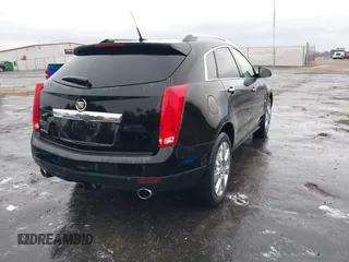 2011 Cadillac SRX Performance Collection with VIN 3GYFNBEYXBS597881, listed as a IAAI auction lot 41016643 with 164,781 mi miles and . Bid and sale history available at carsss.com. Image 4.