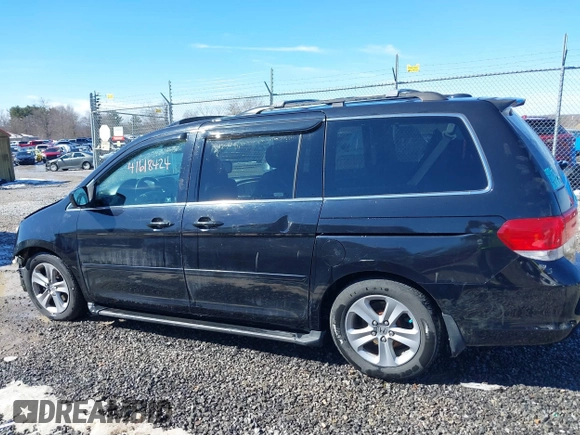 2008 Honda Odyssey Touring with VIN 5FNRL38948B029193, listed as a IAAI auction lot 41618424 with 219,964 mi miles. Bid and sale history available at carsss.com. Image 15.