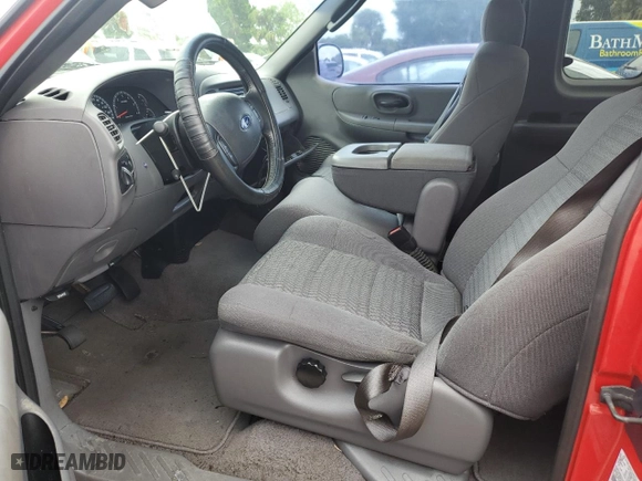2003 Ford F-150 XL with VIN 1FTRX07243KB72082, listed as a Copart auction lot 74593004 with 0 mi miles and Salvage Title. Bid and sale history available at carsss.com. Image 7.