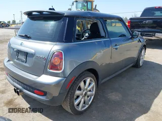 2007 MINI Hardtop S with VIN WMWMF73597TL86892, listed as a IAAI auction lot 42157544 with 93,097 mi miles and . Bid and sale history available at DreamBid. Image 4.
