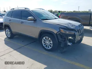 2019 Jeep Cherokee Latitude with VIN 1C4PJLCX2KD318901, listed as a IAAI auction lot 41054380 with 46,603 mi miles. Bid and sale history available at carsss.com. Image 1.