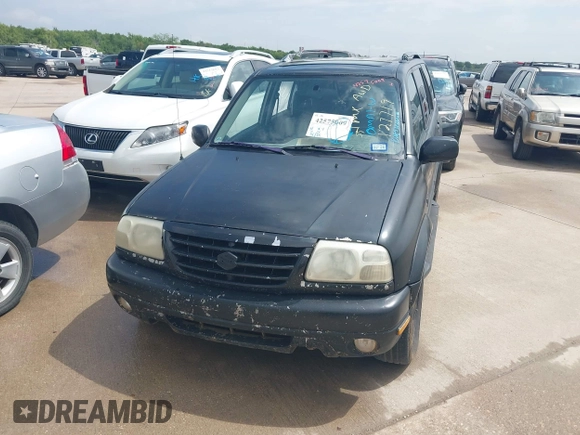 2002 Suzuki XL7 Standard z VIN JS3TX92V924127719, wystawiony jako IAAI lot #42575009 z przebiegiem 298 096 mil mil oraz . Historia ofert i sprzedaży dostępna na DreamBid. Obrazek 6.