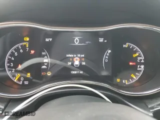 2016 Jeep Grand Cherokee Limited 75th Anniversary with VIN 1C4RJFBG5GC441102, listed as a Copart auction lot 87450344 with 130,811 mi miles and Salvage Title. Bid and sale history available at carsss.com. Image 9.