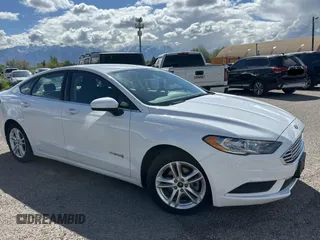 2018 Ford Fusion Hybrid SE with VIN 3FA6P0LU5JR173833, listed as a Copart auction lot 55092565 with 83,242 mi miles and Clean Title. Bid and sale history available at carsss.com. Image 1.