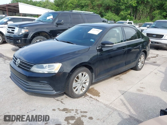 2015 Volkswagen Jetta SE with VIN 3VWD07AJ7FM306911, listed as a IAAI auction lot 42173985 with 143,111 mi miles and . Bid and sale history available at DreamBid. Image 2.