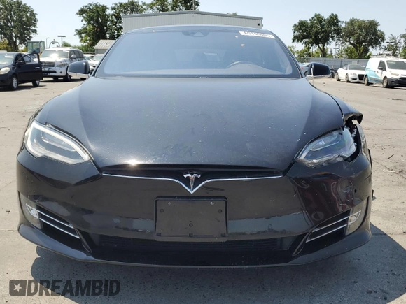 2016 Tesla Model S 90D z VIN 5YJSA1E29GF158774, wystawiony jako Copart lot #60143405 z przebiegiem Nie podano mil oraz Szkoda całkowita • Salvage title. Historia ofert i sprzedaży dostępna na DreamBid. Obrazek 5.