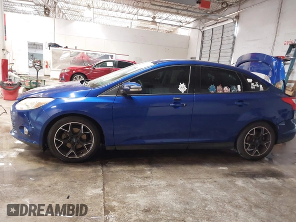 2014 Ford Focus SE with VIN 1FADP3F21EL194900, listed as a IAAI auction lot 41341333 with 103,245 mi miles. Bid and sale history available at carsss.com. Image 14.