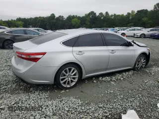 2013 Toyota Avalon XLE with VIN 4T1BK1EB1DU069129, listed as a Copart auction lot 58949285 with 145,431 mi miles and Salvage title. Bid and sale history available at DreamBid. Image 3.