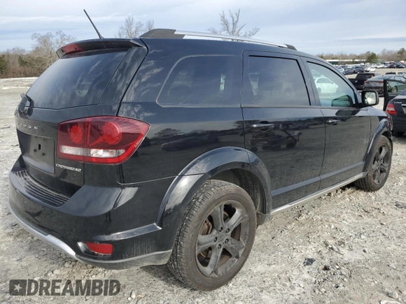 2014 Dodge Journey Crossroad with VIN 3C4PDCGG5ET283724, listed as a Copart auction lot 43251245 with 120,571 mi miles and Salvage title. Bid and sale history available at DreamBid. Image 3.