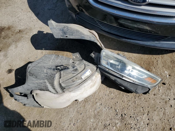 2015 Ford Taurus SEL with VIN 1FAHP2E89FG180089, listed as a Copart auction lot 58445555 with 151,240 mi miles and Salvage title. Bid and sale history available at DreamBid. Image 12.
