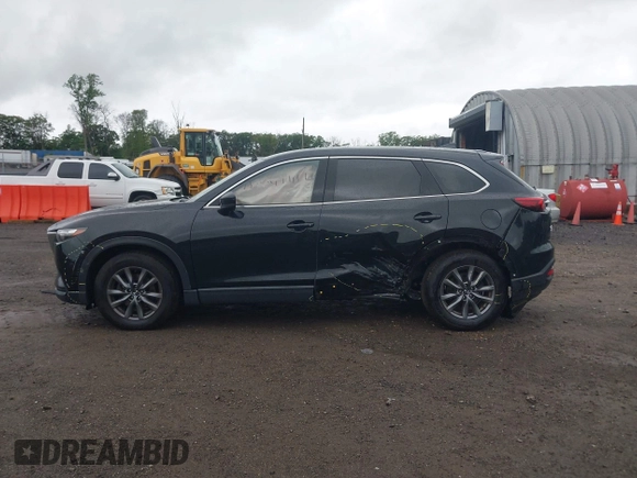 2020 Mazda CX-9 Touring with VIN JM3TCBCY5L0422262, listed as a IAAI auction lot 42456246 with 69,211 mi miles and . Bid and sale history available at DreamBid. Image 14.