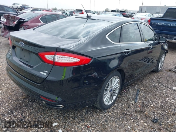 2015 Ford Fusion SE with VIN 3FA6P0H92FR205388, listed as a IAAI auction lot 41699606 with 69,597 mi miles. Bid and sale history available at carsss.com. Image 4.