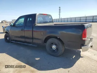 1999 Ford F-150 with VIN 1FTZX1726XKB49687, listed as a Copart auction lot 56416455 with 240,196 mi miles and Salvage title. Bid and sale history available at DreamBid. Image 2.
