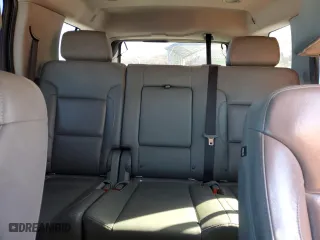 2019 Chevrolet Tahoe LT with VIN 1GNSCBKC5KR353908, listed as a Copart auction lot 41826985 with 97,949 mi miles and Clean Title. Bid and sale history available at carsss.com. Image 10.