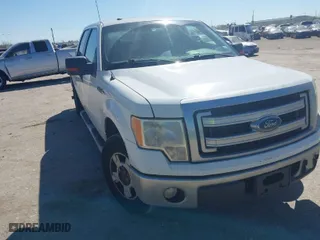 2013 Ford F-150 XL with VIN 1FTFW1CF7DFA66868, listed as a IAAI auction lot 41784163 with 218,303 mi miles. Bid and sale history available at carsss.com. Image 1.
