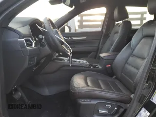 2024 Mazda CX-5 2.5 Turbo Signature with VIN JM3KFBXY7R0515256, listed as a Copart auction lot 87404694 with 4,699 mi miles and Salvage Title. Bid and sale history available at carsss.com. Image 7.