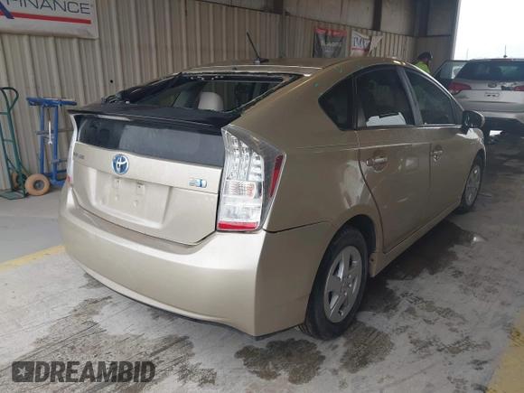 2011 Toyota Prius I with VIN JTDKN3DU2B1447144, listed as a IAAI auction lot 41887553 with 104,860 mi miles. Bid and sale history available at carsss.com. Image 4.