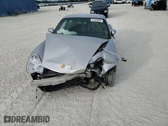 2004 Porsche 911 Carrera z VIN WP0AA29974S620854, wystawiony jako Copart lot #41626835 z przebiegiem 36 268 mil mil oraz Szkoda całkowita • Salvage title. Historia ofert i sprzedaży dostępna na DreamBid. Obrazek 10.
