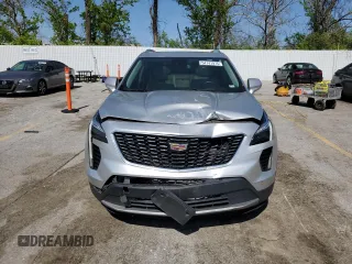 2019 Cadillac XT4 FWD Premium Luxury z VIN 1GYFZCR4XKF224734, wystawiony jako Copart lot #54141975 z przebiegiem 87 633 mil mil oraz Szkody całkowita. Historia ofert i sprzedaży dostępna na DreamBid. Obrazek 5.