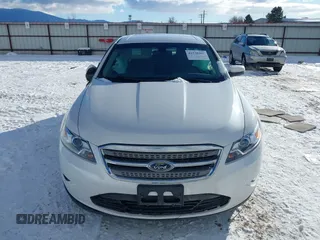 2011 Ford Taurus SEL z VIN 1FAHP2EW2BG143071, wystawiony jako IAAI lot #41538097 z przebiegiem 126 668 mil mil oraz . Historia ofert i sprzedaży dostępna na DreamBid. Obrazek 12.