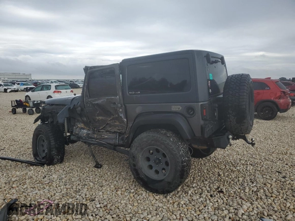 2017 Jeep Wrangler Willys Wheeler with VIN 1C4AJWAG9HL673766, listed as a Copart auction lot 43132555 with 129,422 mi miles and Salvage Title. Bid and sale history available at DreamBid. Image 2.
