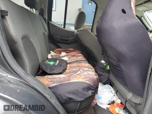 2011 Nissan Xterra S z VIN 5N1AN0NWXBC504569, wystawiony jako Copart lot #57297355 z przebiegiem 151 680 mil mil oraz Szkoda całkowita • Salvage title. Historia ofert i sprzedaży dostępna na DreamBid. Obrazek 11.