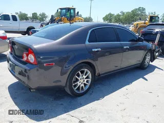 2011 Chevrolet Malibu LTZ with VIN 1G1ZE5E75BF184694, listed as a IAAI auction lot 42002433 with 185,724 mi miles and . Bid and sale history available at DreamBid. Image 4.