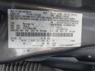 2012 Ford Focus SE z VIN 1FAHP3K21CL347716, wystawiony jako IAAI lot #42415555 z przebiegiem 182 693 mil mil oraz . Historia ofert i sprzedaży dostępna na DreamBid. Obrazek 9.