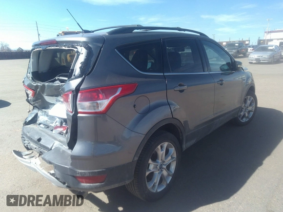 2013 Ford Escape SEL with VIN 1FMCU9H9XDUB32041, listed as a IAAI auction lot 36310371 with 99,560 mi miles. Bid and sale history available at carsss.com. Image 4.