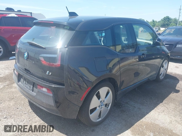 2015 BMW i3 with VIN WBY1Z4C5XFV503375, listed as a IAAI auction lot 42563459 with 38,933 mi miles and . Bid and sale history available at DreamBid. Image 4.