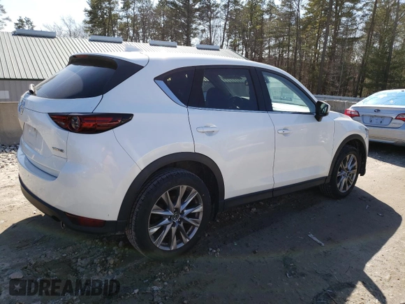 2021 Mazda CX-5 Grand Touring with VIN JM3KFBDM9M1426809, listed as a Copart auction lot 48468345 with 74,500 mi miles and Salvage Title. Bid and sale history available at carsss.com. Image 3.