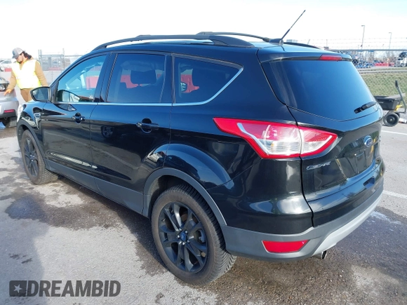 2013 Ford Escape SE with VIN 1FMCU9GX9DUB92246, listed as a IAAI auction lot 41808372 with 73,472 mi miles. Bid and sale history available at carsss.com. Image 3.