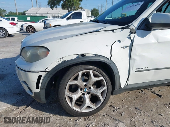 2011 BMW X5 35i with VIN 5UXZV4C52BL410497, listed as a IAAI auction lot 41995459 with 162,781 mi miles. Bid and sale history available at carsss.com. Image 6.