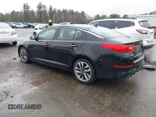 2015 Kia Optima SX Turbo with VIN 5XXGR4A65FG406037, listed as a IAAI auction lot 41975555 with 100,468 mi miles. Bid and sale history available at carsss.com. Image 3.
