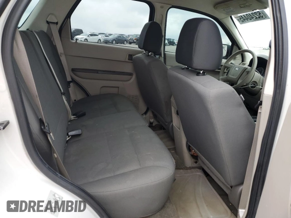 2011 Ford Escape XLS with VIN 1FMCU0C71BKB89898, listed as a Copart auction lot 52240445 with 180,201 mi miles and Salvage title. Bid and sale history available at DreamBid. Image 11.