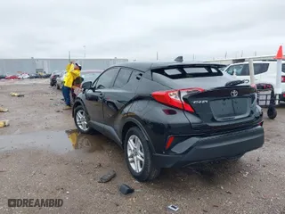 2021 Toyota C-HR LE with VIN JTNKHMBX9M1106493, listed as a IAAI auction lot 41557468 with 67,710 mi miles. Bid and sale history available at carsss.com. Image 3.