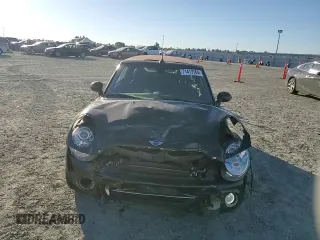 2015 MINI Convertible with VIN WMWZN3C53FT862859, listed as a Copart auction lot 71419764 with 113,356 mi miles and Salvage title. Bid and sale history available at DreamBid. Image 11.