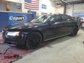 2015 Audi A8 L 4.0T with VIN WAU32AFD3FN036507, listed as a Copart auction lot 82298094 with 77,156 mi miles and Salvage Title. Bid and sale history available at carsss.com. Image 1.
