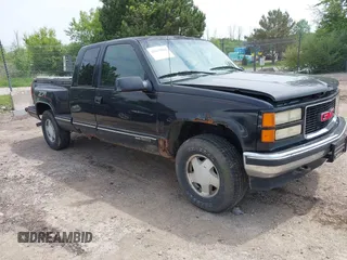 1996 GMC Sierra 1500 z VIN 2GTEK19R0T1511482, wystawiony jako IAAI lot #42415000 z przebiegiem 164 429 mil mil oraz . Historia ofert i sprzedaży dostępna na DreamBid. Obrazek 1.