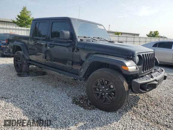 2023 Jeep Gladiator Sport S with VIN 1C6HJTAG7PL517812, listed as a Copart auction lot 60200015 with 38,793 mi miles and Clean title. Bid and sale history available at DreamBid. Image 4.