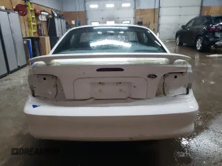 1995 Ford Mustang with VIN 1FALP404XSF266697, listed as a Copart auction lot 47772545 with 97,995 mi miles and Clean Title. Bid and sale history available at carsss.com. Image 6.