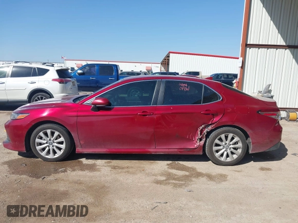 2019 Toyota Camry LE with VIN 4T1B11HK4KU725075, listed as a IAAI auction lot 41781275 with 156,856 mi miles and . Bid and sale history available at DreamBid. Image 14.