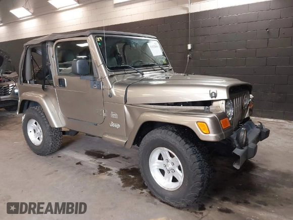 2004 Jeep Wrangler Sahara with VIN 1J4FA59S64P736389, listed as a IAAI auction lot 41432819 with 102,830 mi miles and . Bid and sale history available at DreamBid. Image 1.