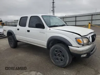 2002 Toyota Tacoma PreRunner with VIN 5TEGN92N82Z027415, listed as a Copart auction lot 49446035 with 349,964 mi miles and Salvage Title. Bid and sale history available at DreamBid. Image 4.