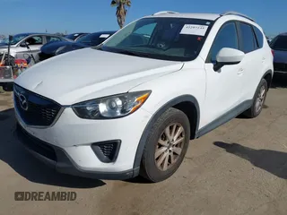 2013 Mazda CX-5 Sport with VIN JM3KE2BE4D0153251, listed as a IAAI auction lot 42297235 with 177,019 mi miles and . Bid and sale history available at DreamBid. Image 2.