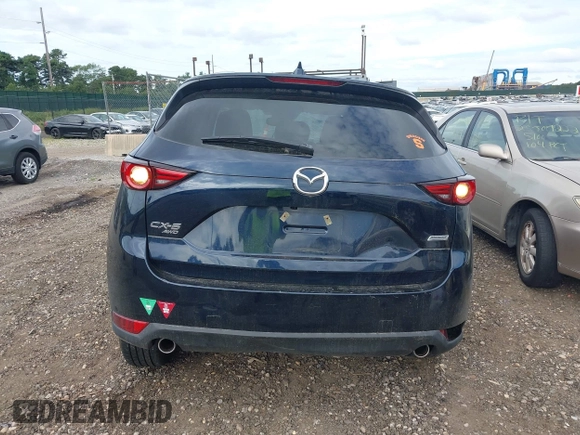 2019 Mazda CX-5 Grand Touring with VIN JM3KFBDM8K1521231, listed as a IAAI auction lot 42738963 with 32,179 mi miles and . Bid and sale history available at DreamBid. Image 16.