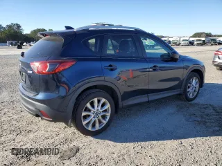 2014 Mazda CX-5 Grand Touring with VIN JM3KE4DY1E0405493, listed as a Copart auction lot 41688915 with 94,970 mi miles and Salvage Title. Bid and sale history available at carsss.com. Image 3.