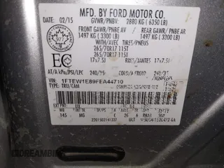 2015 Ford F-150 XLT with VIN 1FTEW1E89FFA44710, listed as a IAAI auction lot 41521584 with 158,297 mi miles. Bid and sale history available at carsss.com. Image 9.